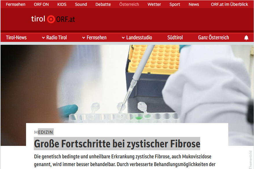 Screenshot von Einstieg des Artikels "Große Fortschritte bei zystischer Fibrose", zu sehen ein Laborszene.